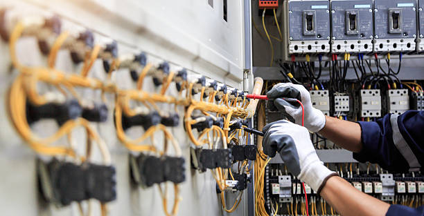 Professional Electrician technician working in Rainbow Park, FL